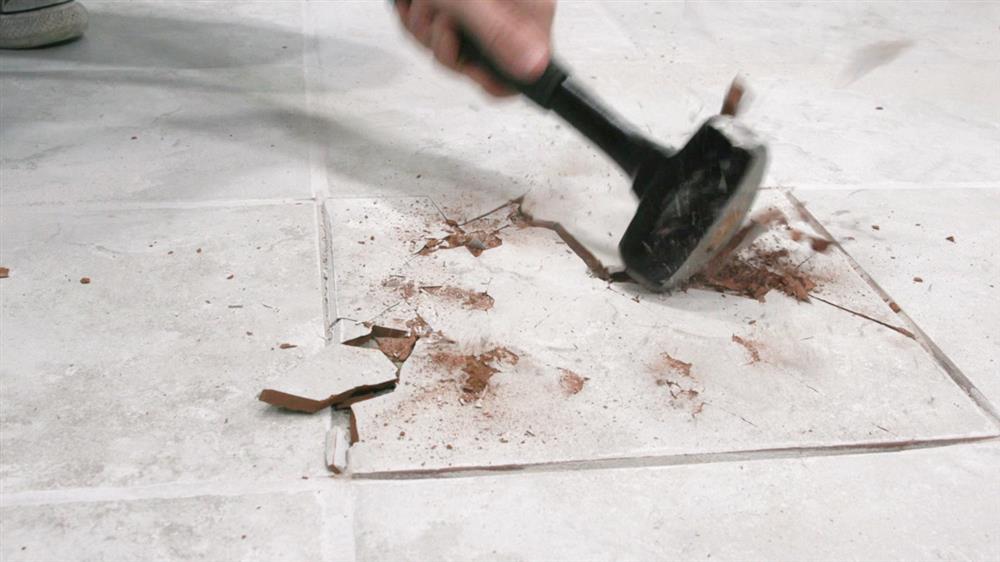 Replace A Broken Floor Tile, How To Use A Tile Chipper